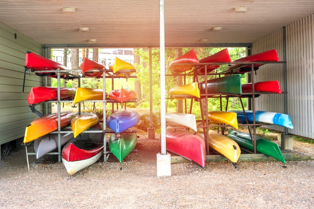 A front view of collections of kayaks