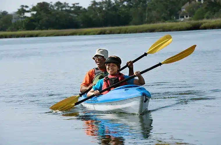 A couple enjoying kayaking in the sea