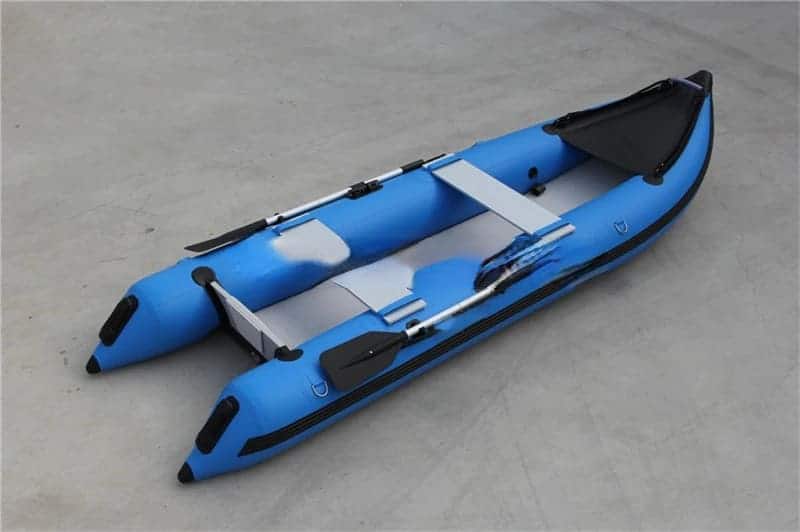 blue colored inflatable kayak