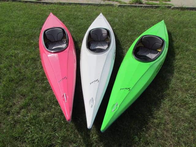 carbon fiber kayaks on ground