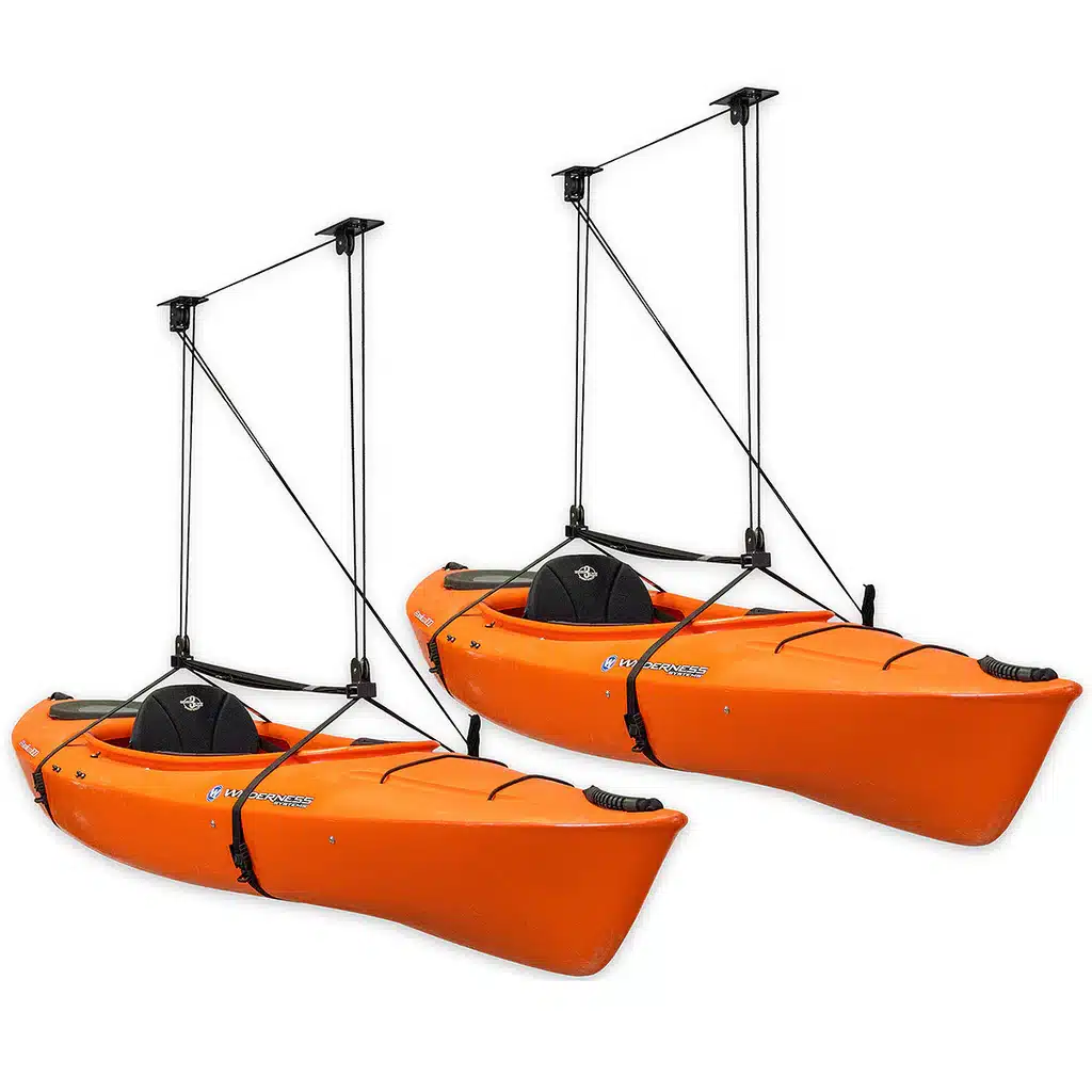 orange color kayaks with hoisting mechanism hangings