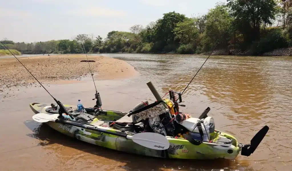 a kayak with stored equipments and accessories