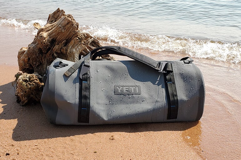 YETI Panga Duffel Bag placed on the beach