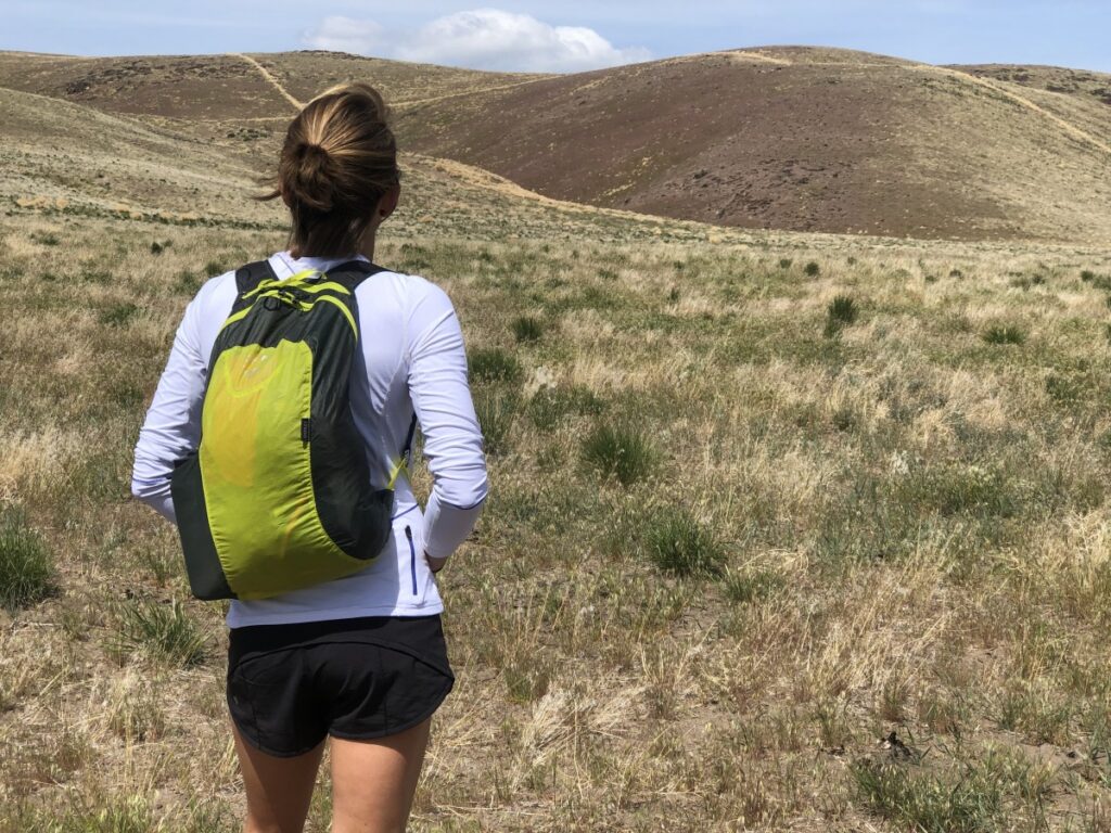 a hiker carrying https osprey sac