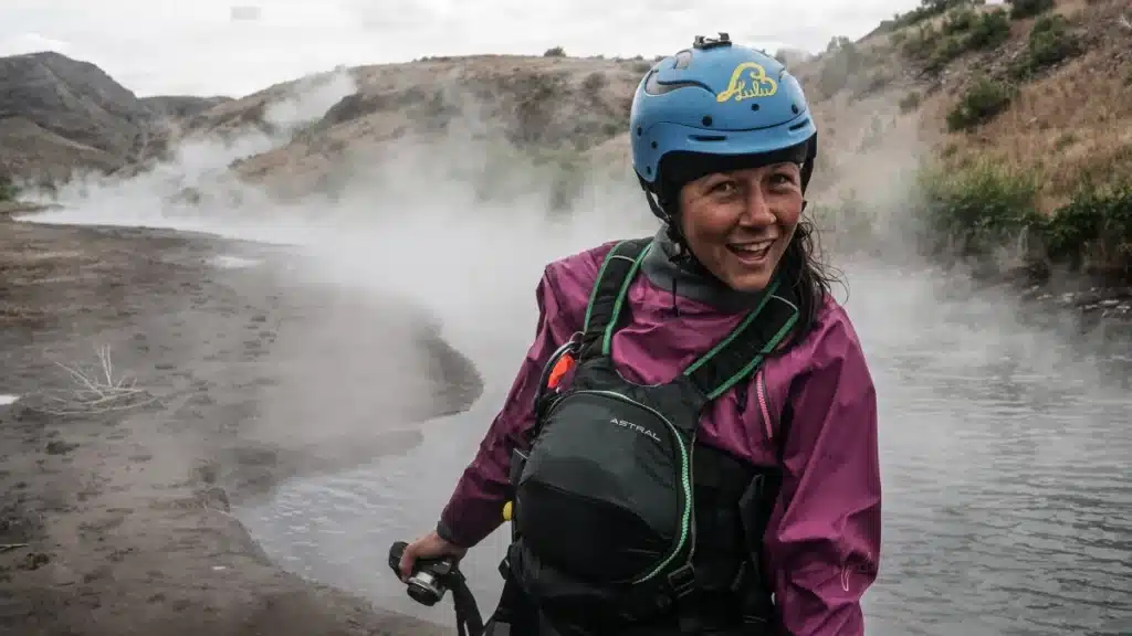 a lady kayaker wearing Astral BlueJacket PFD