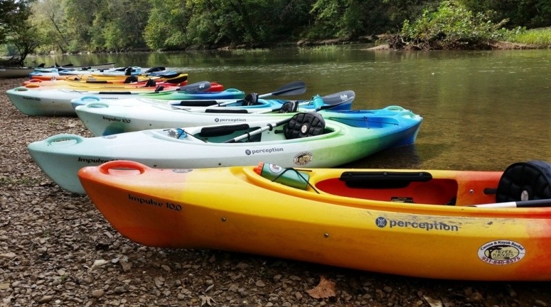 kayaks on the sie of river