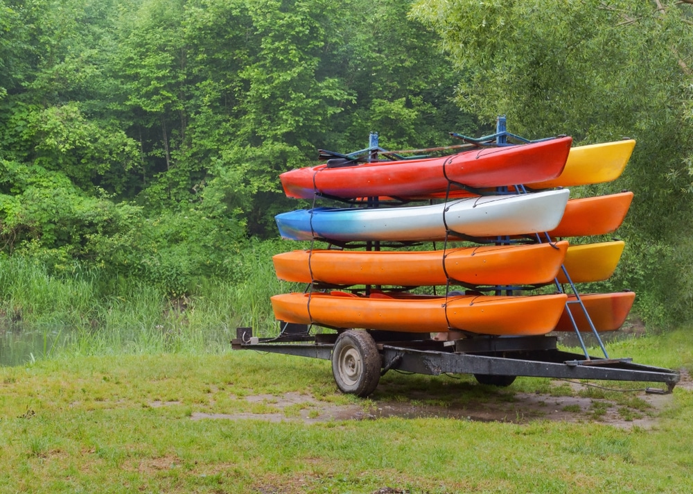 On The Trailer With Eight Canoes Kayaks By Car Delivered